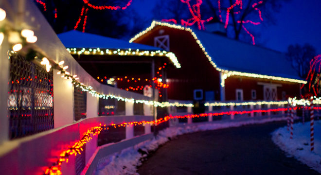 The big red barn at Sibley Park decorated for Kiwanis Holiday Light Display: A colorful Christmas outdoor Holiday Light show by the Kiwanis club in Mankato- on display in Sibley Park- the perfect winter activity for the whole family to enjoy. Click to find out when Santa is available