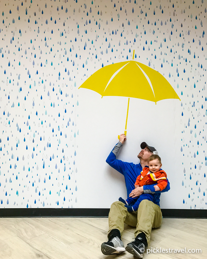 under the umbrella at Galleria Art Walls